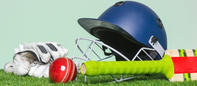 Cricket helmet, gloves and cricket bat