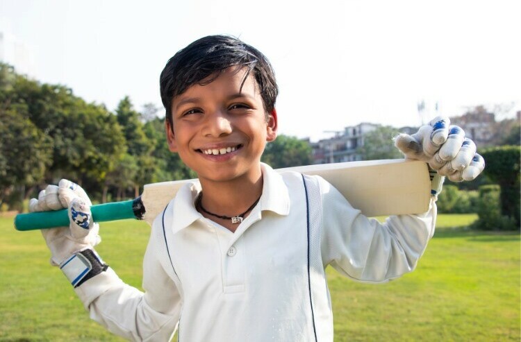 Boy with cricket bat