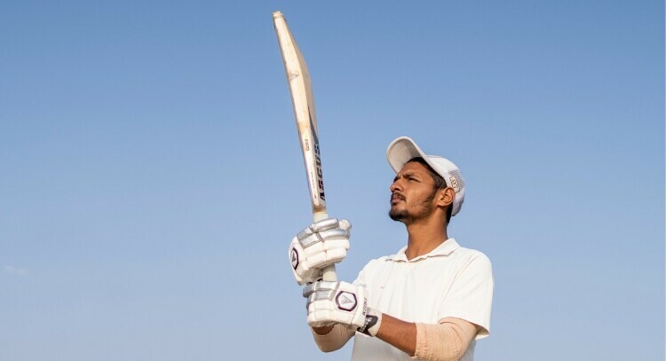 Man with cricket bat